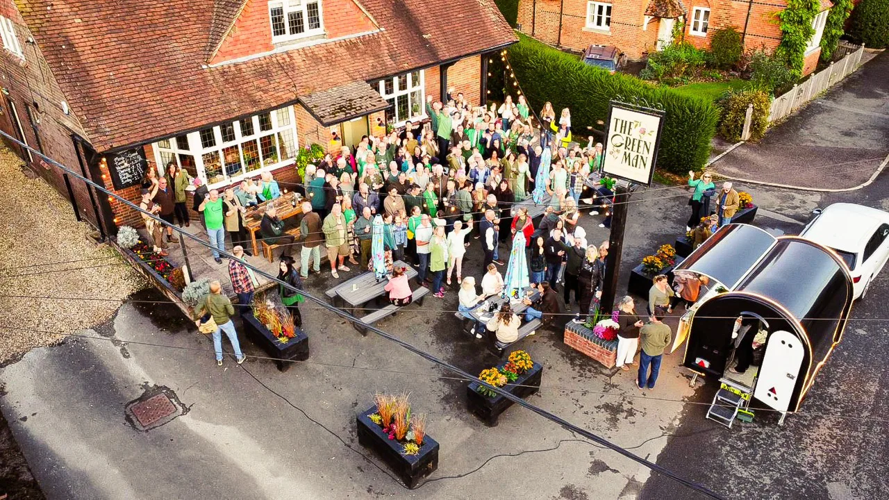 A large outdoor event with The Roast Wrap Co. trailer